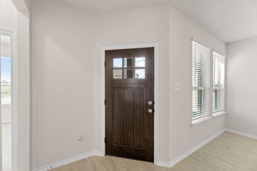 Front exterior of a new home in Creekshaw, Royse City, TX, highlighting curb appeal (Image 5).