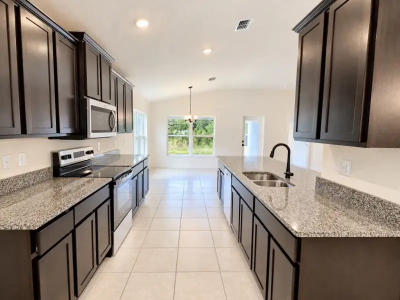 Furnished interior view inside a new home in Harmony Central, Harmony (Image 6).