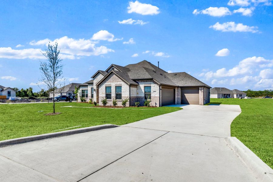 Front exterior of a new home in Berkshire Estates, Mesquite, TX, highlighting curb appeal (Image 19).