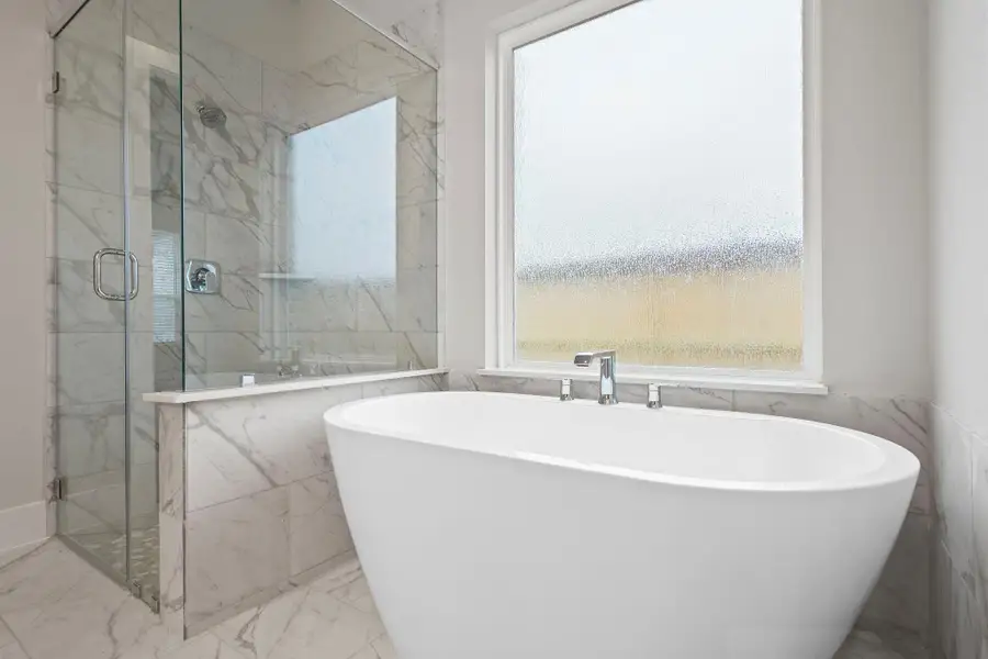 Furnished interior view inside a new home in Barton Creek Ranch, Conroe (Image 7).