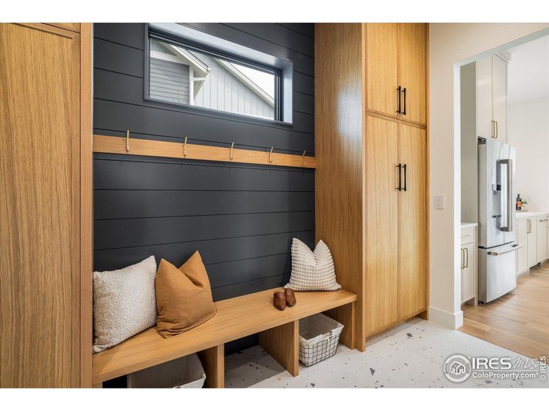 You won't believe how fabulous this mudroom / drop-zone inside the garage entry is!