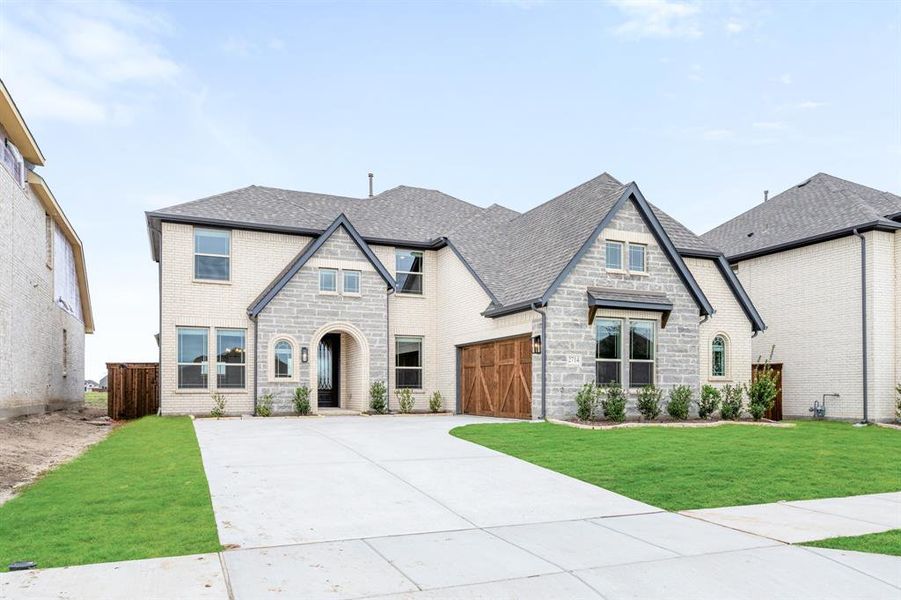 Front exterior of a new home in Meraki, Forney, TX, highlighting curb appeal (Image 23).