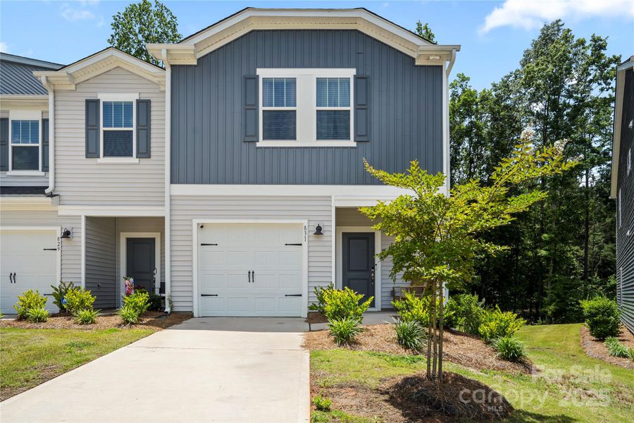Front exterior of a new home in , Fort Mill, SC, highlighting curb appeal (Image 1).