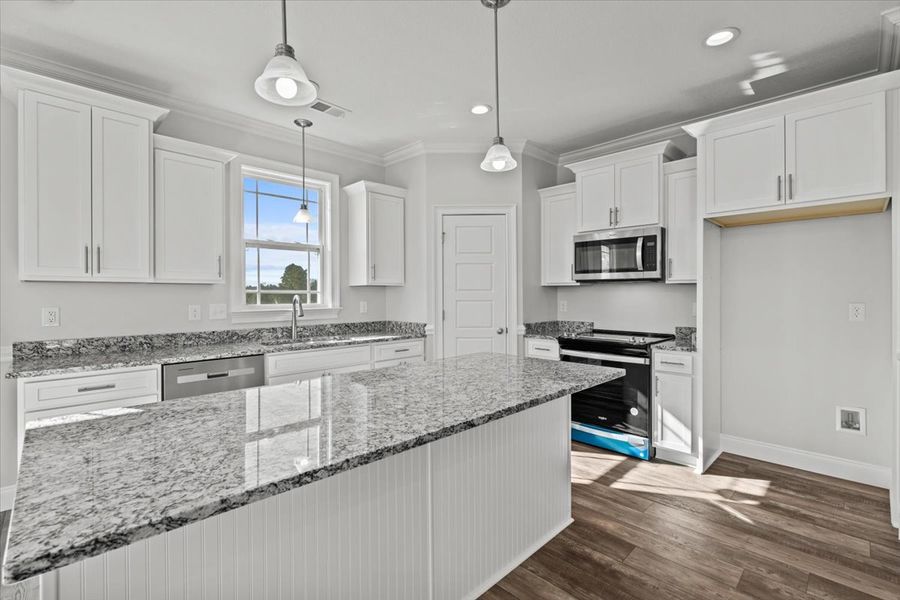 Representative furnished interior of a home built from the Roosevelt by Enchanted Homes in Guadalupe Heights, Seguin (Image 8).