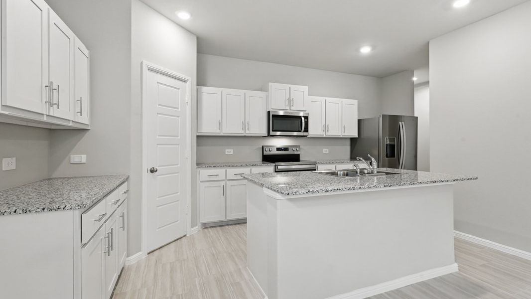 Representative furnished interior of a home built from the HAZELNUT by D.R. Horton in Orchard Village, Fort Worth (Image 6).