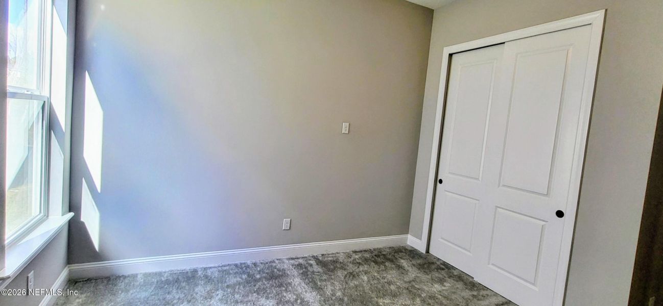 Spacious, unfurnished interior of a new home in , St. Johns (Image 54).