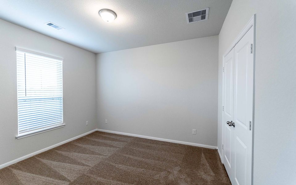 Spacious, unfurnished interior of a new home in Canterra Creek, Iowa Colony (Image 34). Spacious, unfurnished interior of a new home in Canterra Creek, Iowa Colony (Image 34).