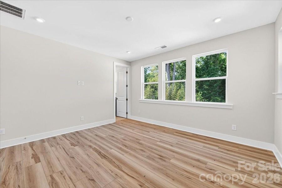 Light filled primary bedroom