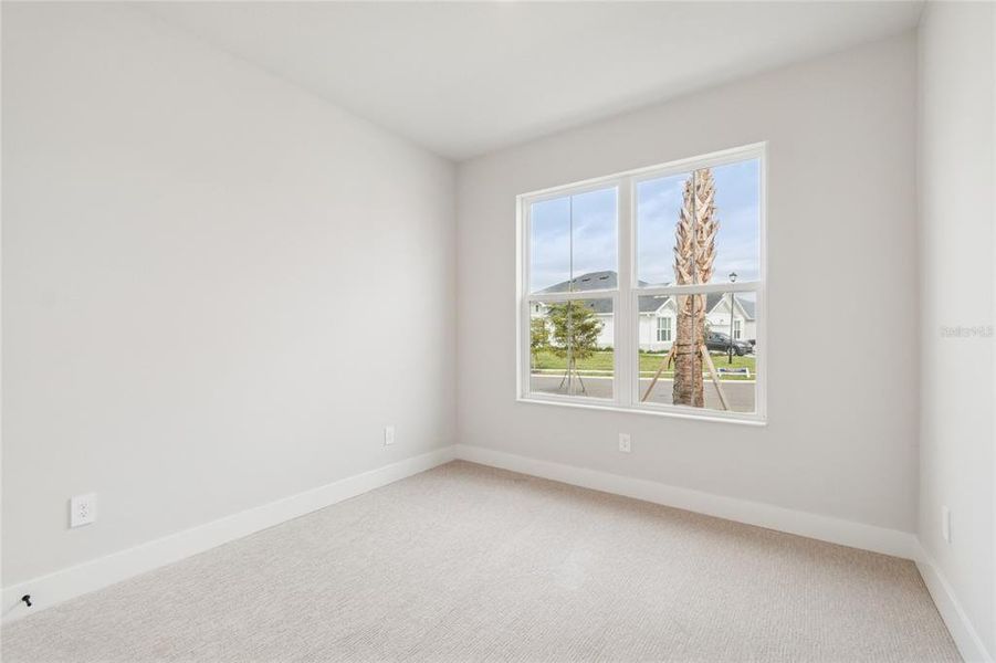 Spacious, unfurnished interior of a new home in Gracewater at Sarasota, Sarasota (Image 32).