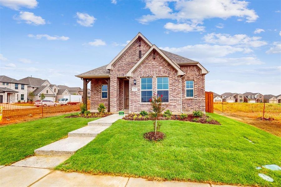 Front exterior of a new home in Lilybrooke at Legacy Hills, Celina, TX, highlighting curb appeal (Image 21). Front exterior of a new home in Lilybrooke at Legacy Hills, Celina, TX, highlighting curb appeal (Image 21).