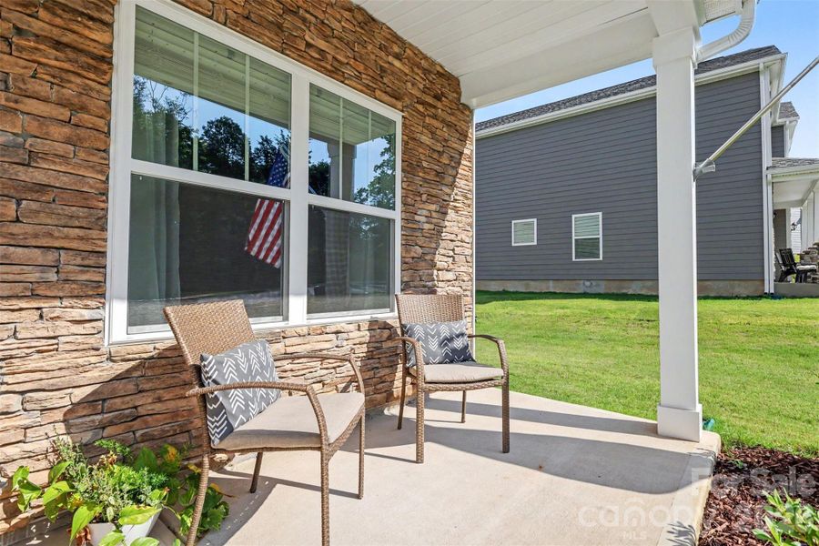 Exterior details and patio area of a home in Lakeshore at Windstone, Mooresville (Image 26).