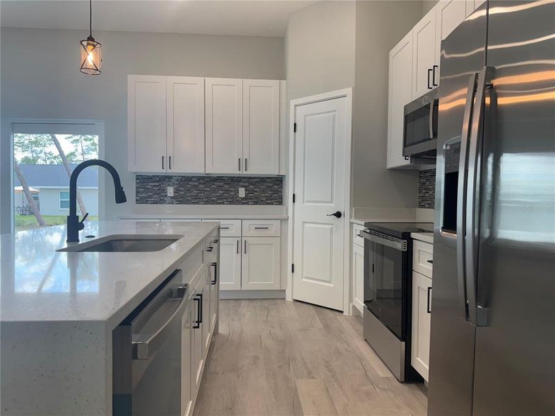 Furnished interior view inside a new home in , Ocala (Image 13).