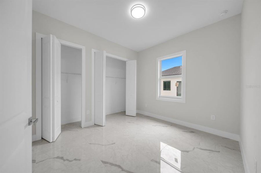 Spacious, unfurnished interior of a new home in , Lehigh Acres (Image 26).