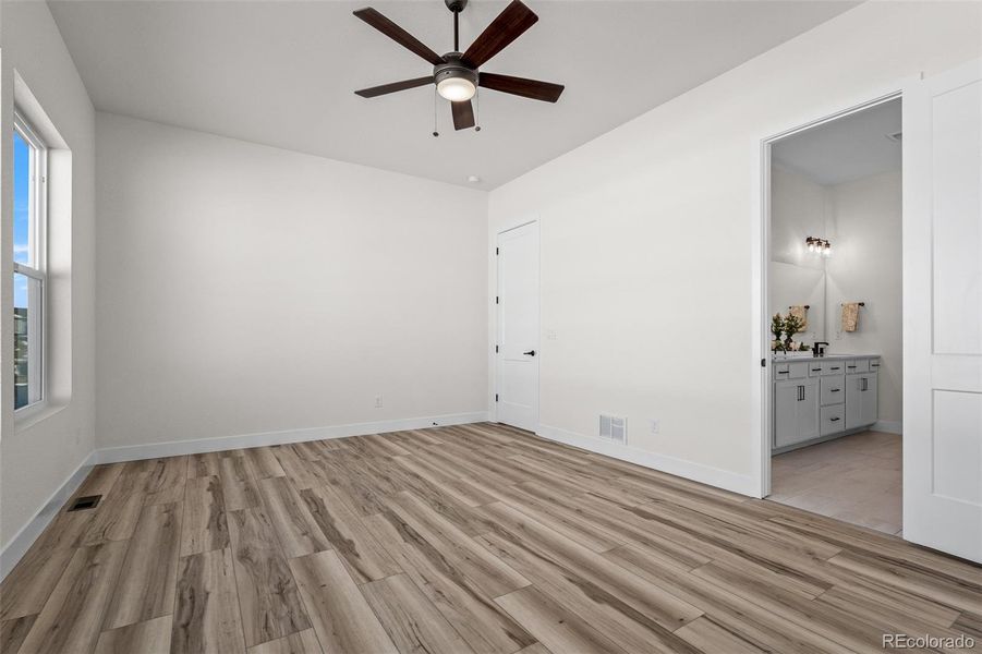 Spacious, unfurnished interior of a new home in Wolf Ranch - Enclave Collection, Colorado Springs (Image 22).