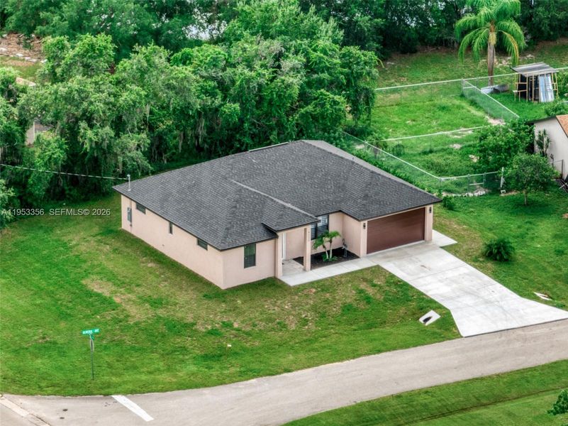 Front exterior of a new home in , Sebring, FL, highlighting curb appeal (Image 24).