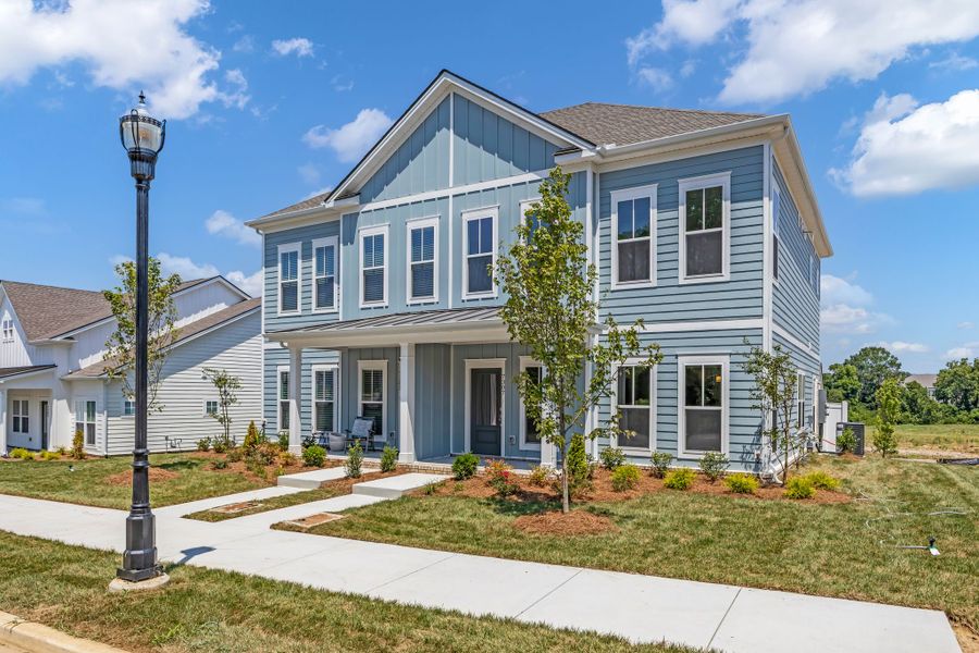 Front exterior of a new home in Carothers Farms, Nolensville, TN, highlighting curb appeal (Image 22).