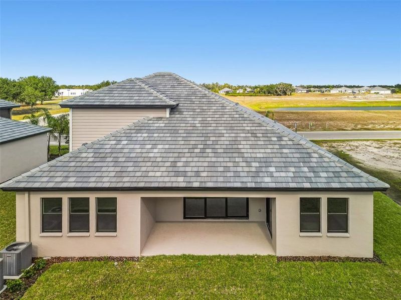 Exterior details and patio area of a home in River Preserve Estates, Parrish (Image 3).