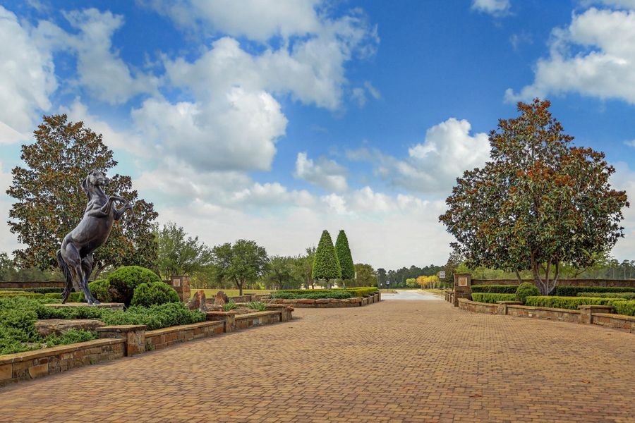 Signature bronze stallion marking the entrance to Stallion Lakes.