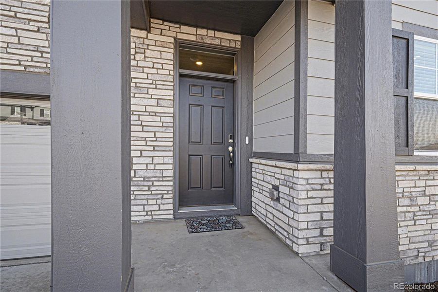 Exterior details and patio area of a home in Murphy Creek, Aurora (Image 3).