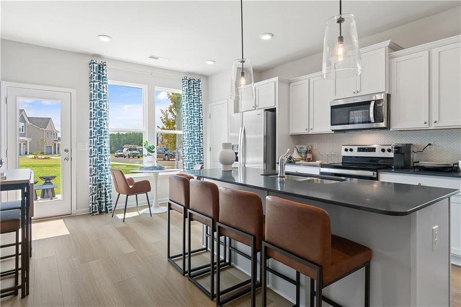 Furnished interior view inside a new home in Enclave at Evergreen, Fairburn (Image 12).