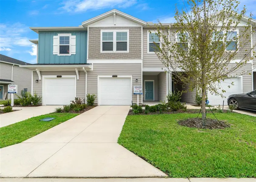 Front exterior of a new home in , Ocala, FL, highlighting curb appeal (Image 22).