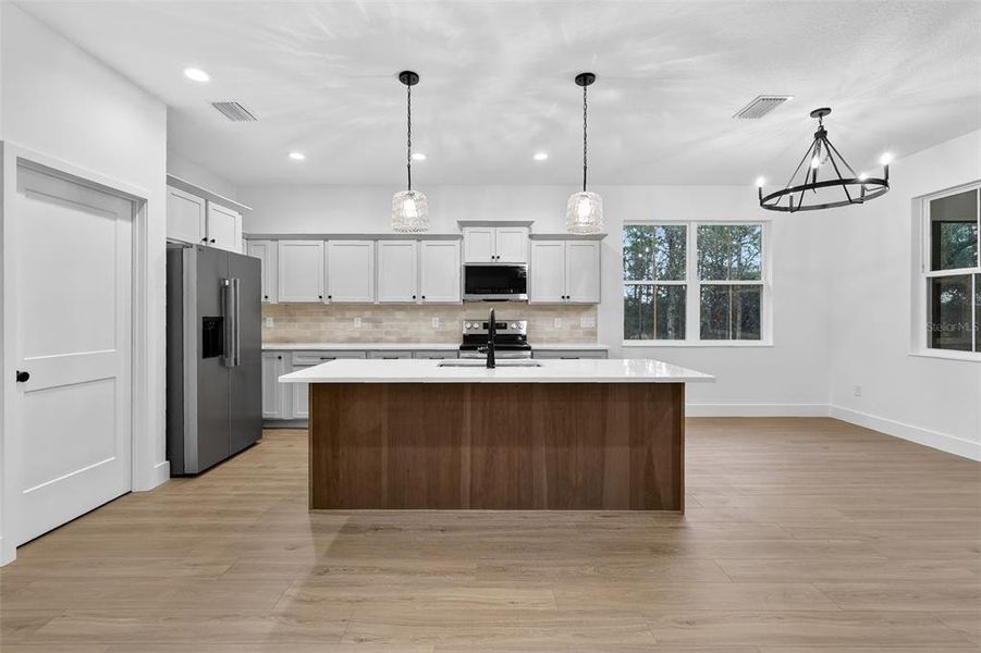 Furnished interior view inside a new home in , Wildwood (Image 5).