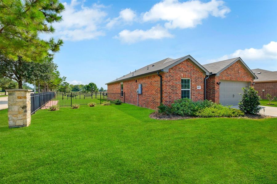 Exterior details and patio area of a home in Bauer Landing, Hockley (Image 17).