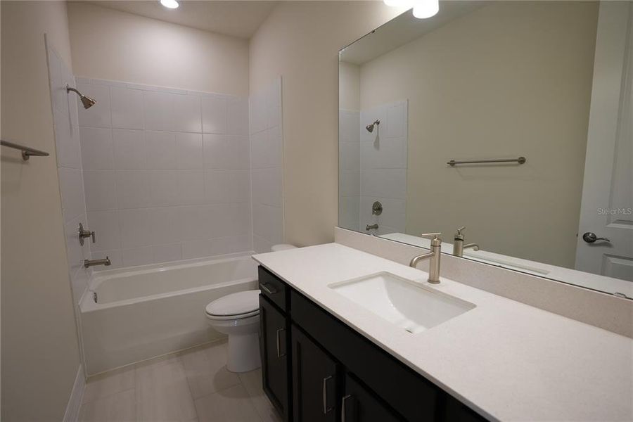 Furnished interior view inside a new home in Parkview Reserve, Orlando (Image 32).