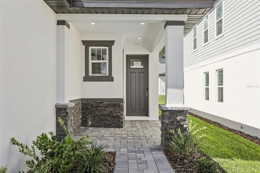 Exterior details and patio area of a home in Cyrene at Minneola, Minneola (Image 21).