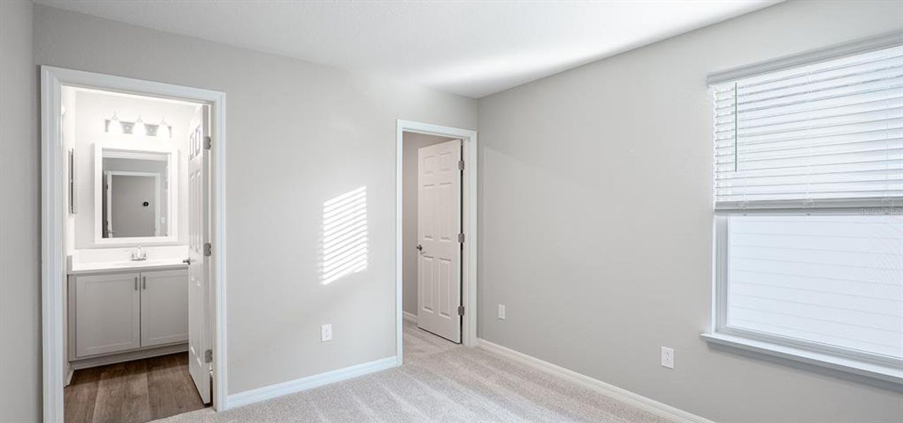 Spacious, unfurnished interior of a new home in The Crossings - Bungalows, St. Cloud (Image 12).