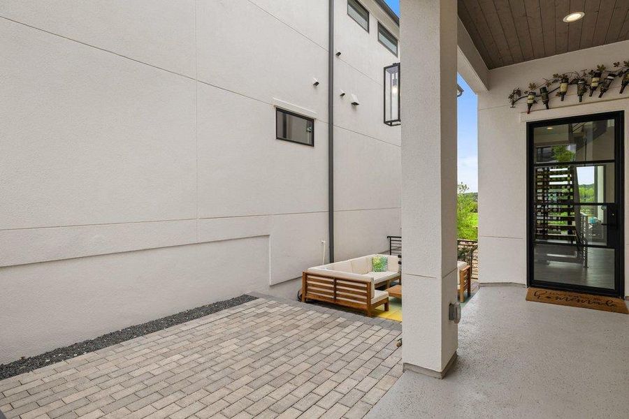 Paved patio with decorative stone border
