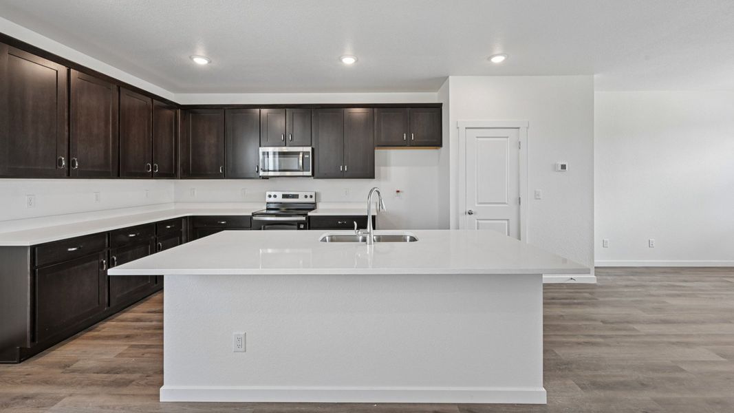 Furnished interior view inside a new home in Windler Townhomes, Aurora (Image 24). Furnished interior view inside a new home in Windler Townhomes, Aurora (Image 24).