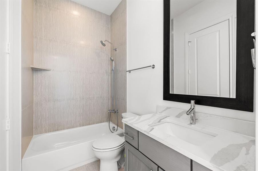 Image of model home with similar floorplan.