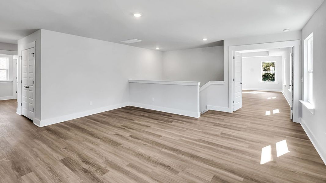Spacious, unfurnished interior of a new home in The Haven at Indigo Preserve, Leland (Image 24).