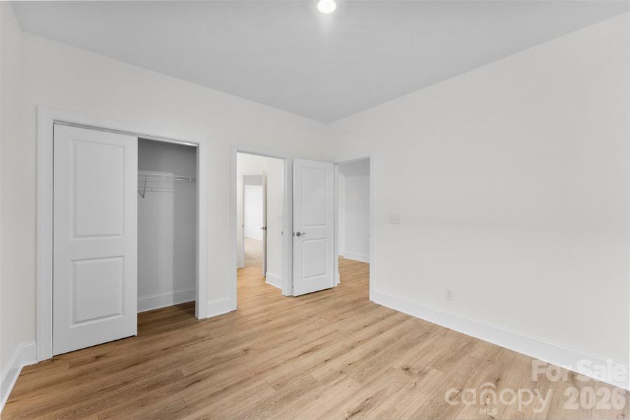 Spacious, unfurnished interior of a new home in The Courtyards on New Hope, Gastonia (Image 18).