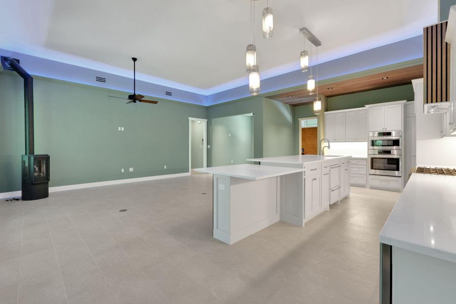 The seamless flow between kitchen and living is perfect for entertaining or everyday comfort.