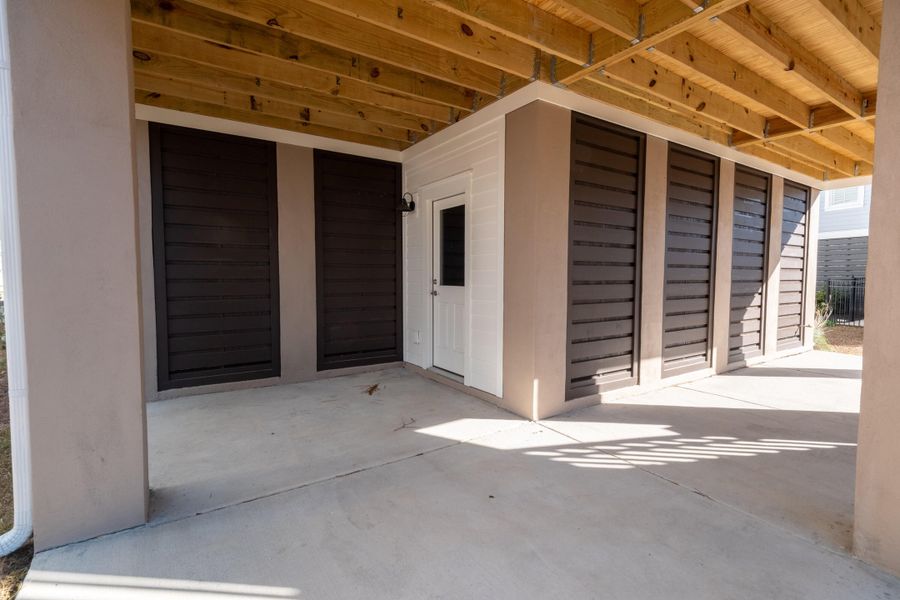 Exterior details and patio area of a home in Wando Village, Charleston (Image 35).