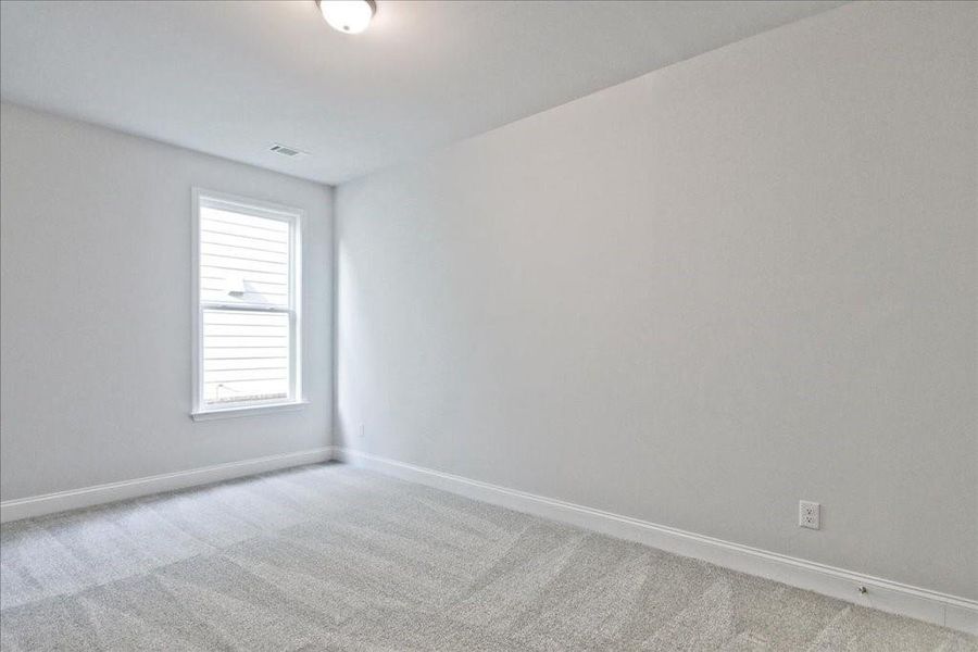 Spacious, unfurnished interior of a new home in Cooper's Walk, Loganville (Image 25).