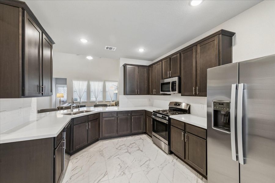 Furnished interior view inside a new home in Stonebrooke, Conroe (Image 24).