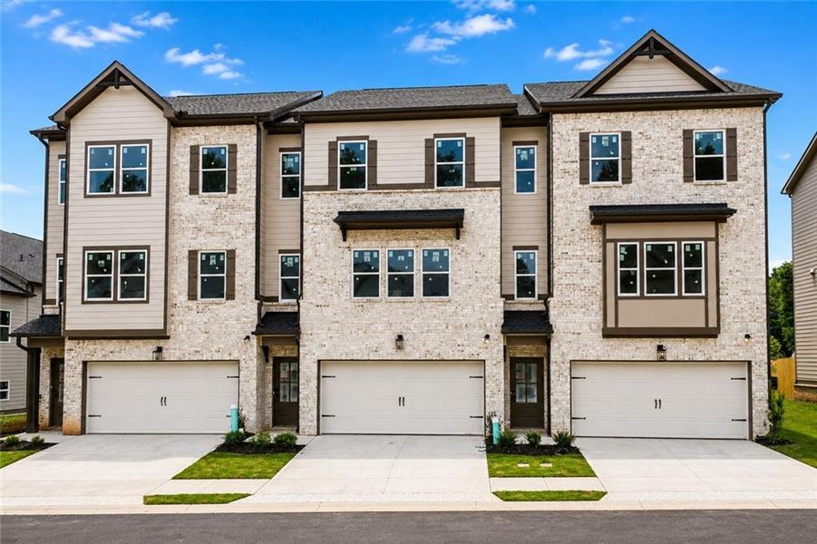 Front exterior of a new home in , Norcross, GA, highlighting curb appeal (Image 1). Front exterior of a new home in , Norcross, GA, highlighting curb appeal (Image 1).