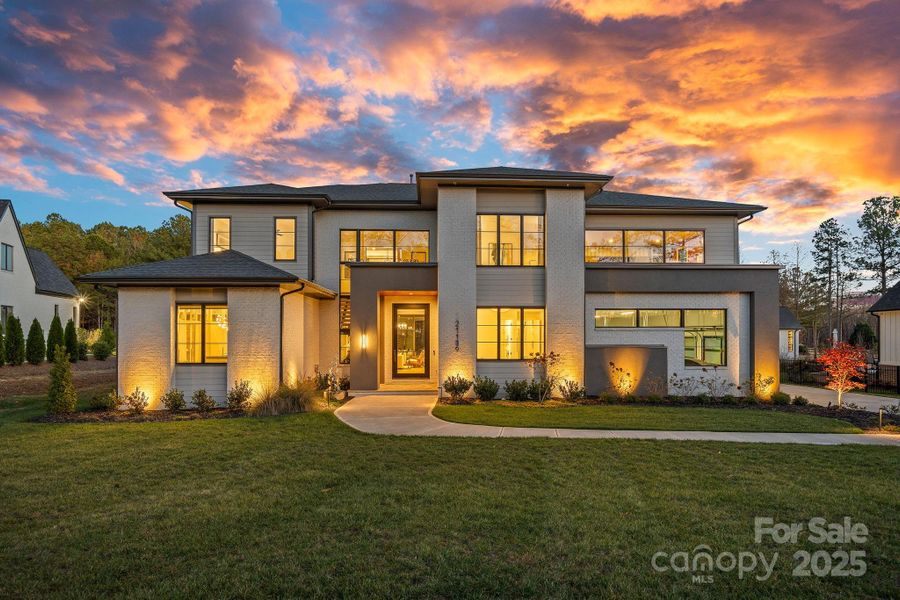 Front exterior of a new home in , Davidson, NC, highlighting curb appeal (Image 1).