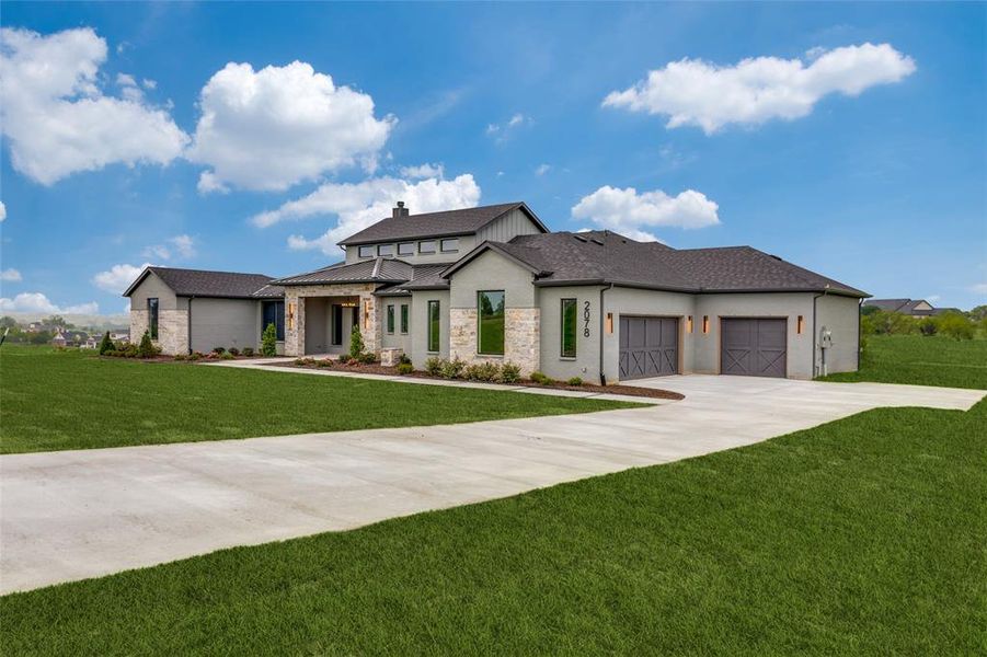 Front exterior of a new home in , Aledo, TX, highlighting curb appeal (Image 1). Front exterior of a new home in , Aledo, TX, highlighting curb appeal (Image 1).