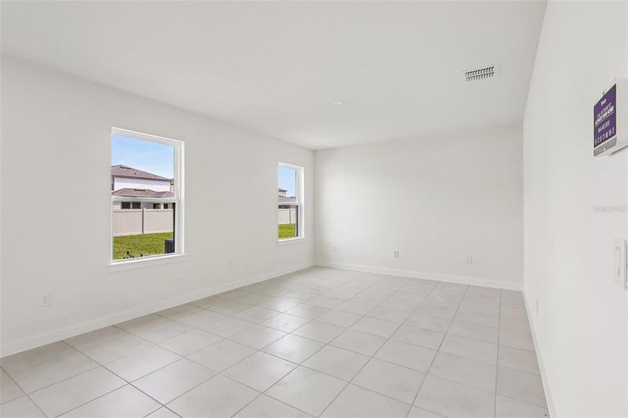 Spacious, unfurnished interior of a new home in Grasslands West, Lakeland (Image 31).