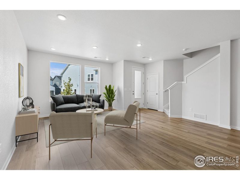 Furnished interior view inside a new home in Kinston Mainstreet Townhomes, Loveland (Image 8). Furnished interior view inside a new home in Kinston Mainstreet Townhomes, Loveland (Image 8).