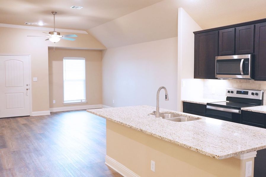 Representative furnished interior of a home built from the The Cumberland by Wyldewood Homes in Washington Meadows, Sherman (Image 5).