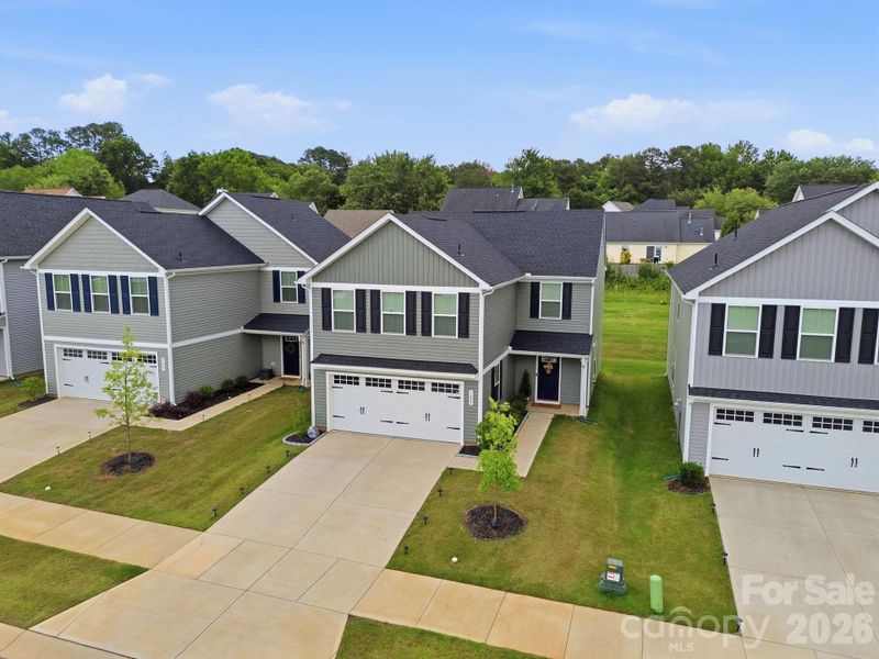 Front exterior of a new home in , Charlotte, NC, highlighting curb appeal (Image 22). Front exterior of a new home in , Charlotte, NC, highlighting curb appeal (Image 22).