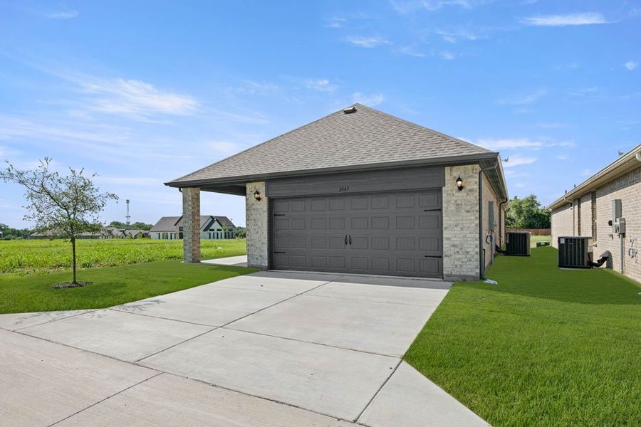 Front exterior of a new home in Redden Farms – Active Adult, Midlothian, TX, highlighting curb appeal (Image 30). Front exterior of a new home in Redden Farms – Active Adult, Midlothian, TX, highlighting curb appeal (Image 30).