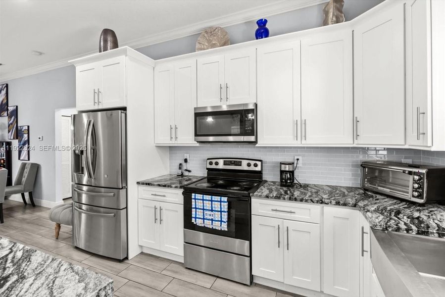 Furnished interior view inside a new home in , Port St. Lucie (Image 32).