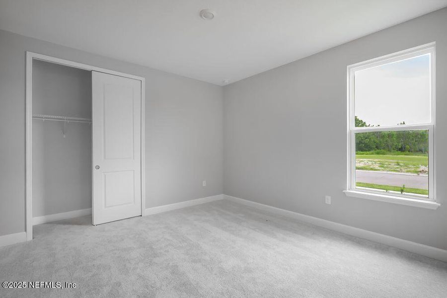 Spacious, unfurnished interior of a new home in Colbert Landings, Palm Coast (Image 29).