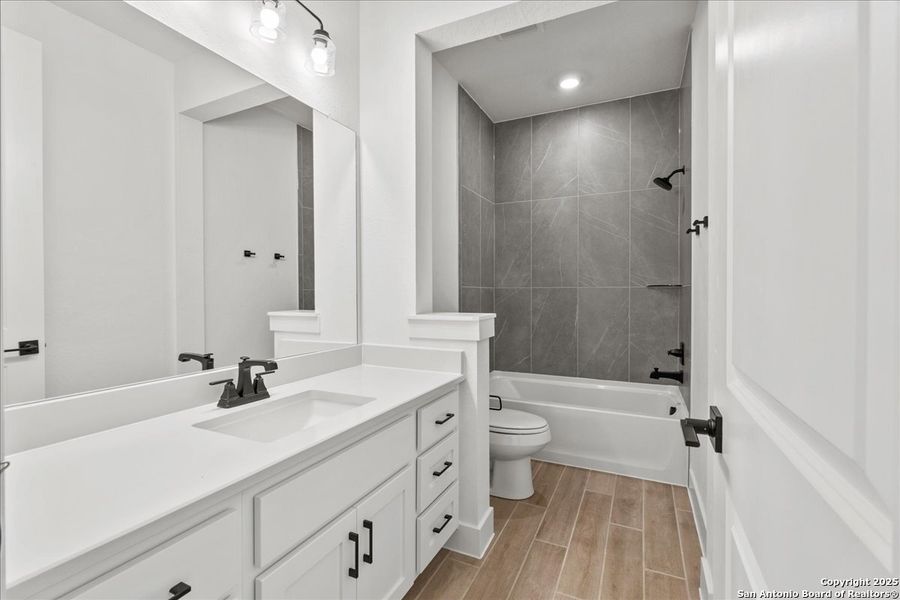 Furnished interior view inside a new home in Village at Three Oaks, Seguin (Image 8).